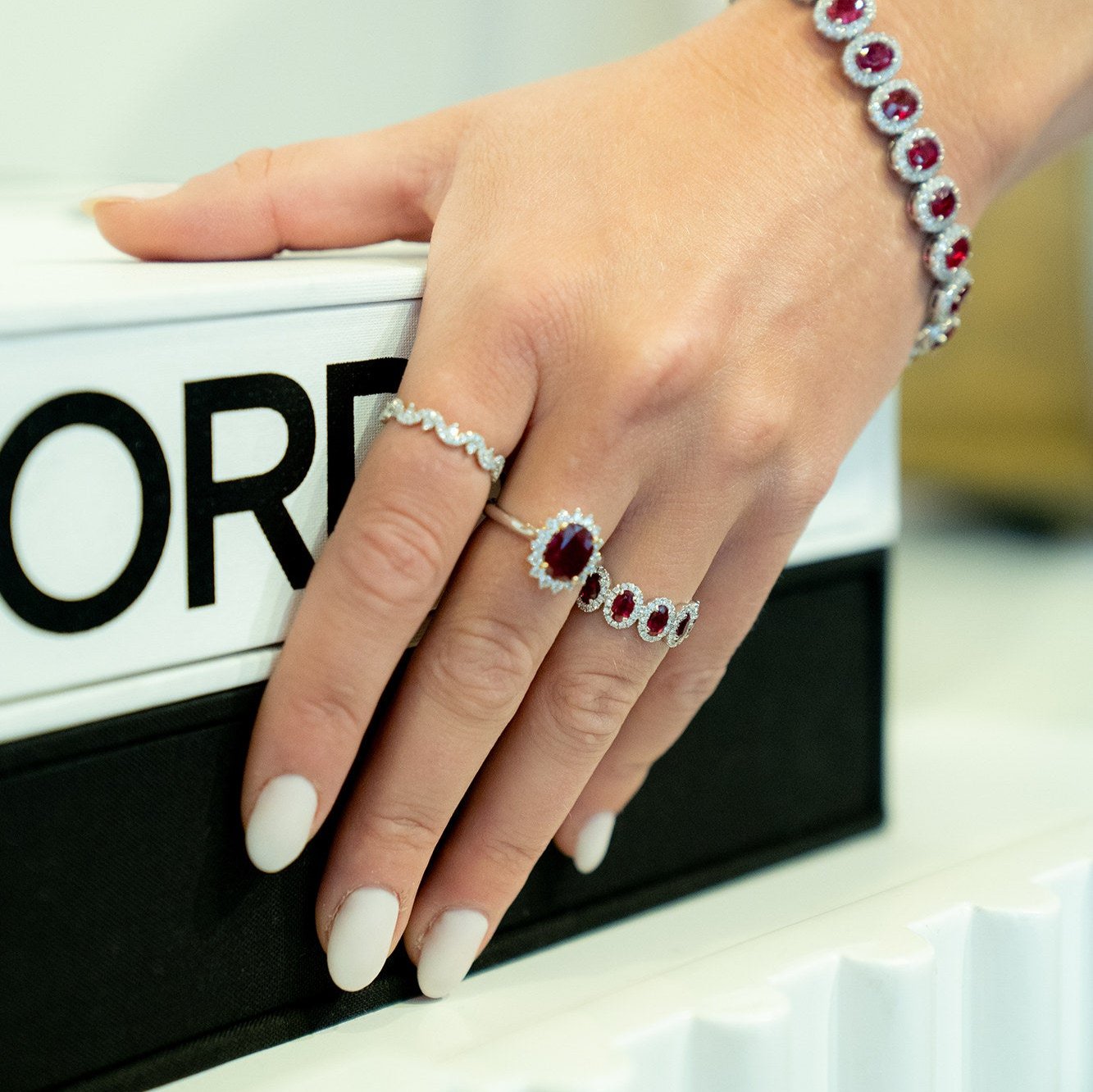 PLATINUM HALO RUBY ETERNITY RING - Jackson Hole Jewelry Company