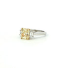 Fancy Yellow Radiant Cut Diamond Three-Stone Ring in Platinum & 18K Yellow Gold - Jackson Hole Jewelry Company