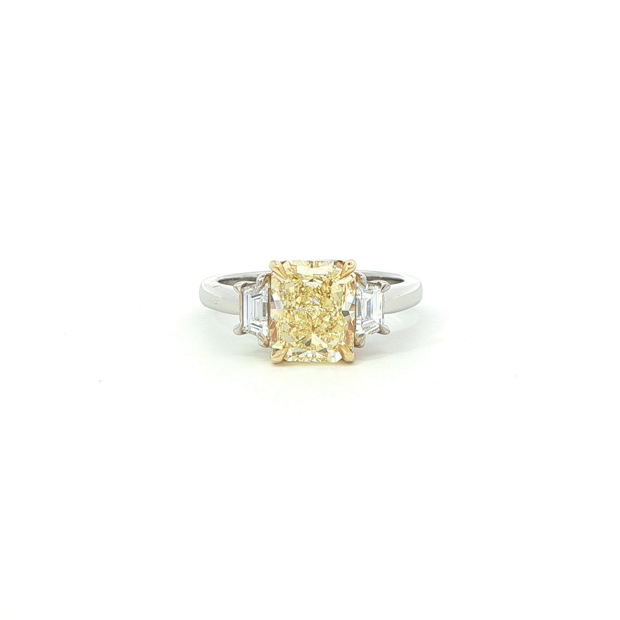Fancy Yellow Radiant Cut Diamond Three-Stone Ring in Platinum & 18K Yellow Gold - Jackson Hole Jewelry Company